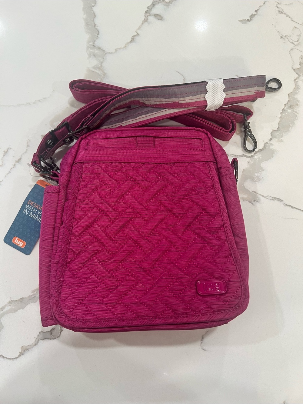 NWT Lug Flapper Convertible Crossbody Bag in a brushed orchid Magenta
